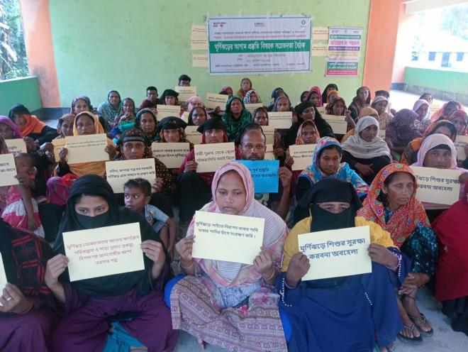 Participants in the awareness meeting on cyclone preparedness